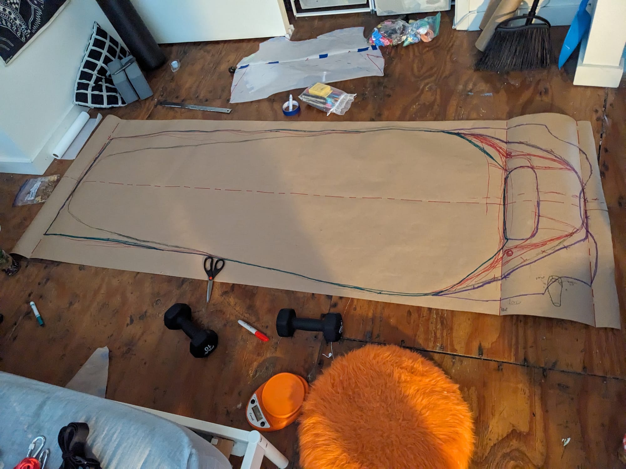 kraft paper pattern, with many lines sketched over each other in different colored markers