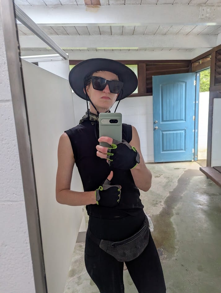 mirror selfie: hat, sunglasses, bandana, fanny pack, half gloves