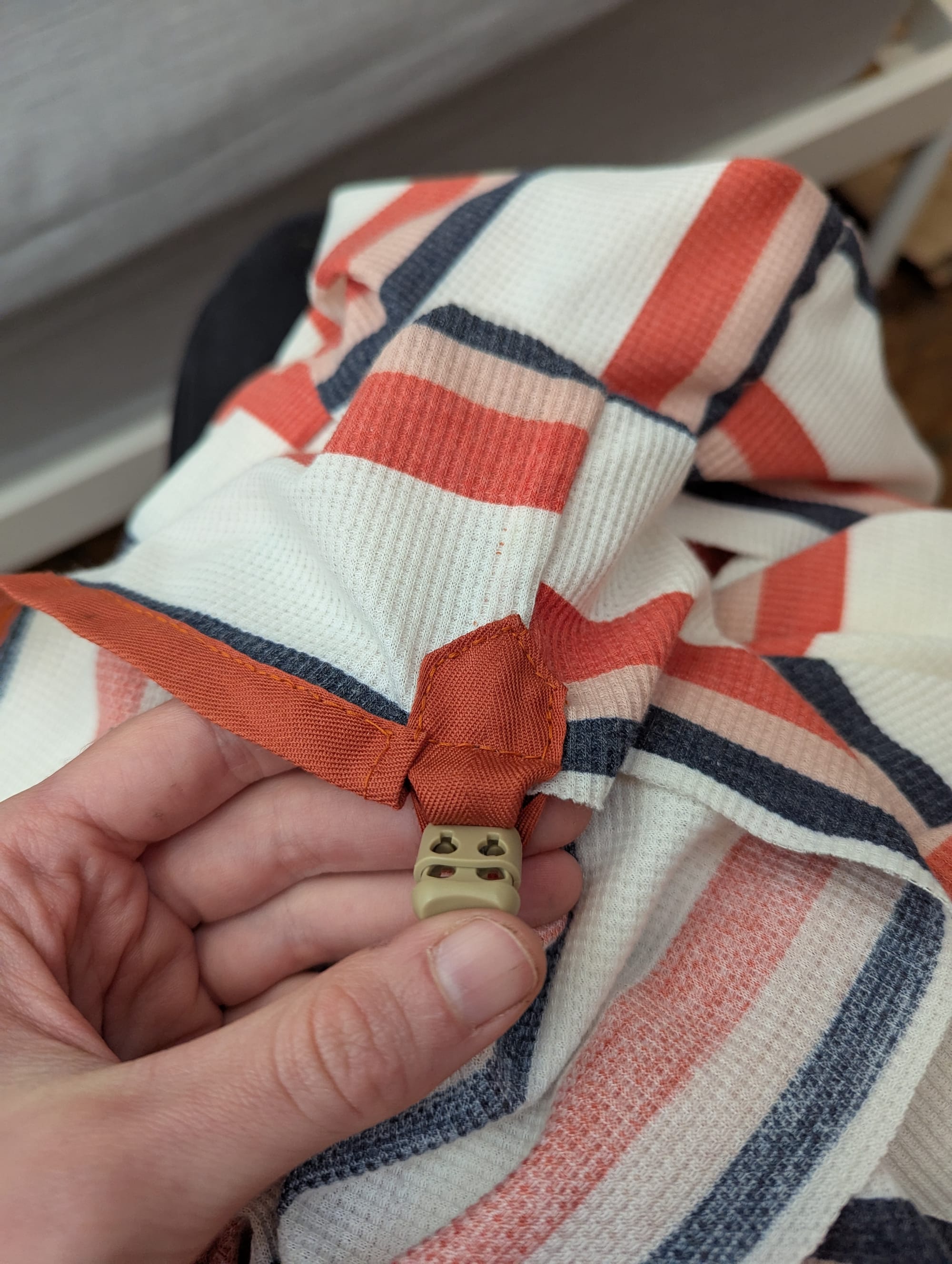 closeup of the finished tab, with drawstring channel sewn on one side
