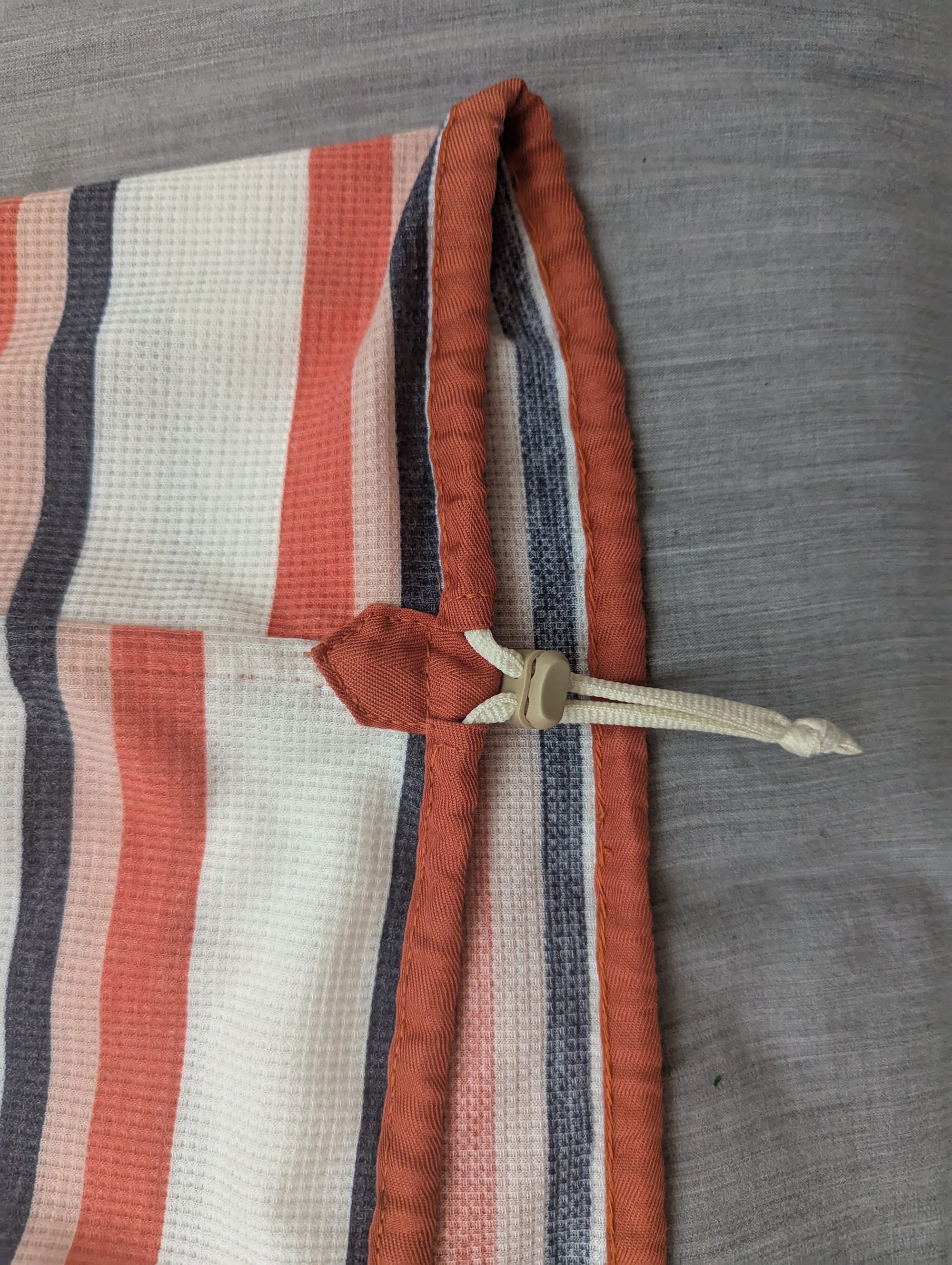 finished tab with drawstring