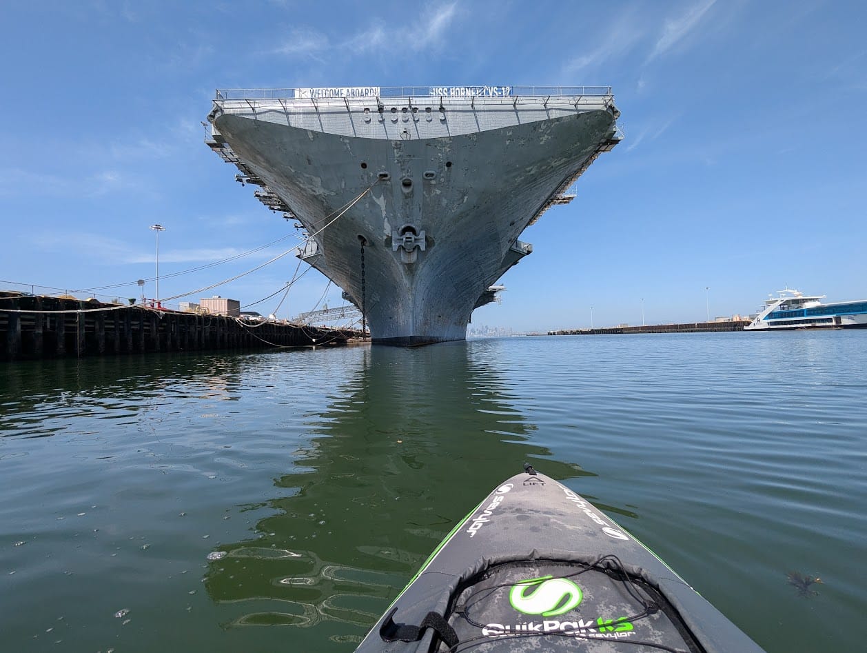 my boat looking at the front of the big boat