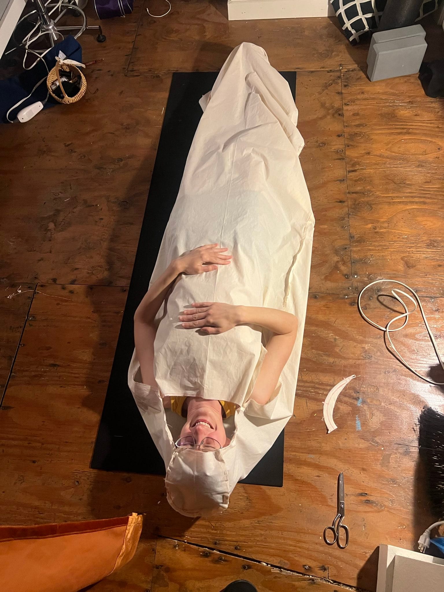 me laying down in my bag liner prototype