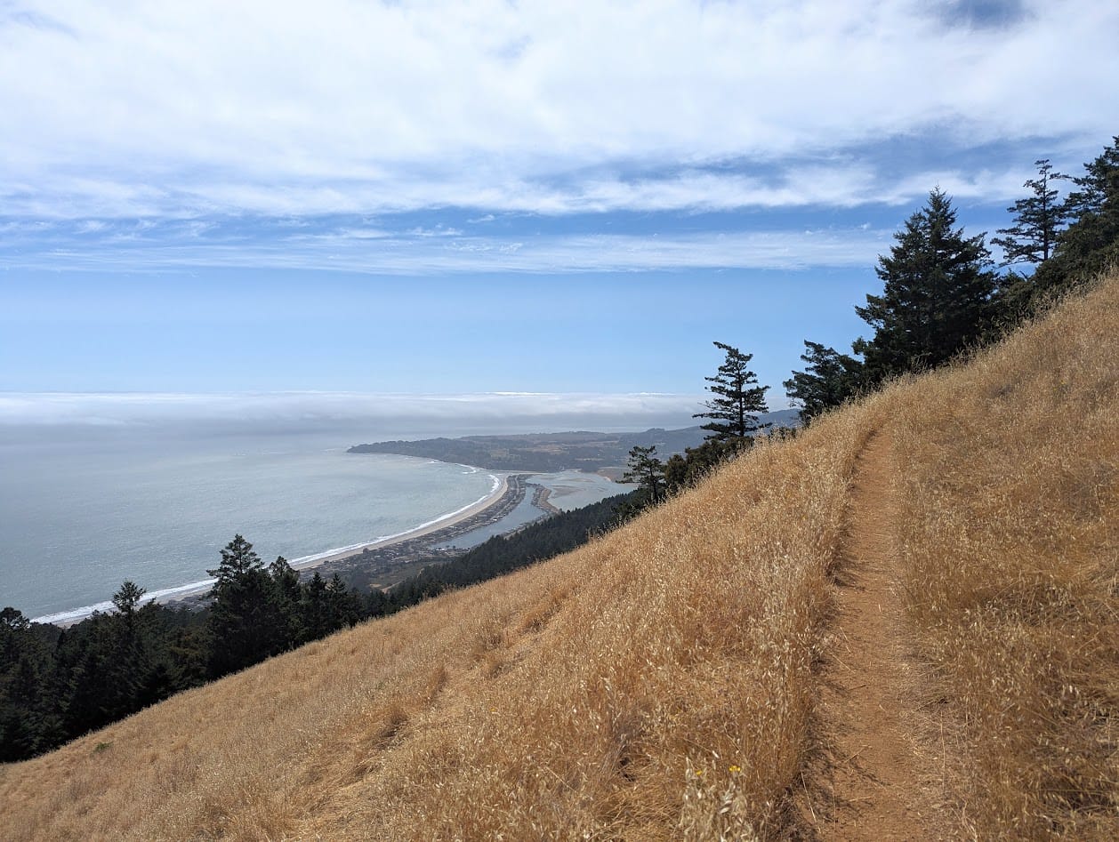 dirt path overlooking the town of Stinson Beach