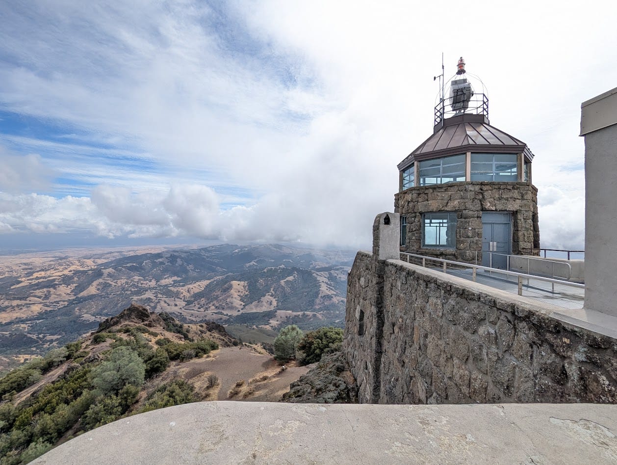 looking at an observation tower and a view that goes for miles