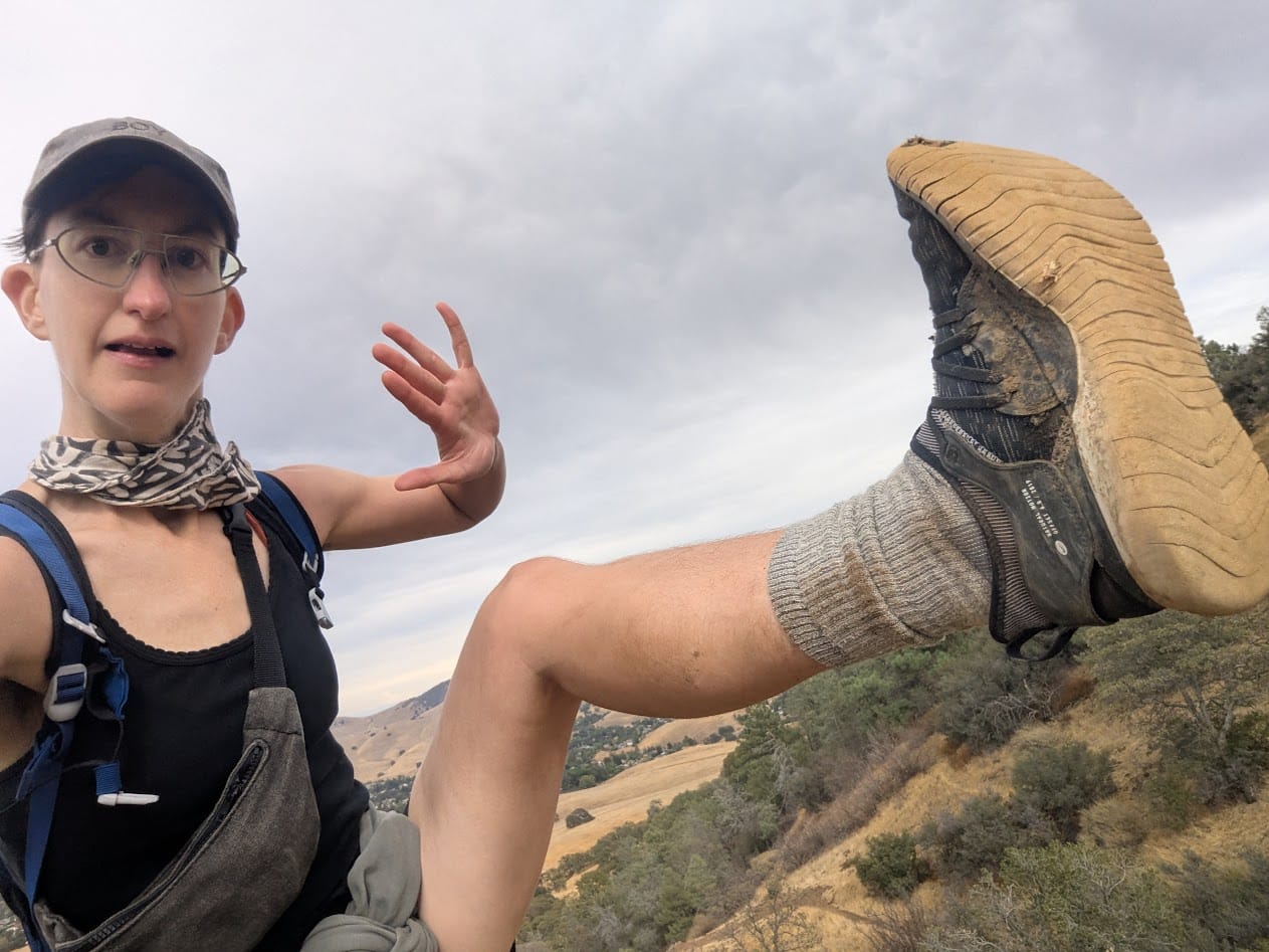 me holding up 5 fingers and a foot